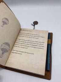 Global Journey Travel Journal 2024, Tomorrowland 2024 festival collectible, detail view