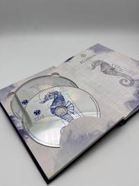 The Story of Planaxis CD , Tomorrowland 2018 festival collectible, detail view